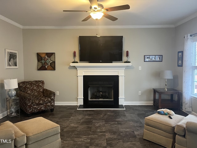 living room featuring ceiling fan and ornamental molding