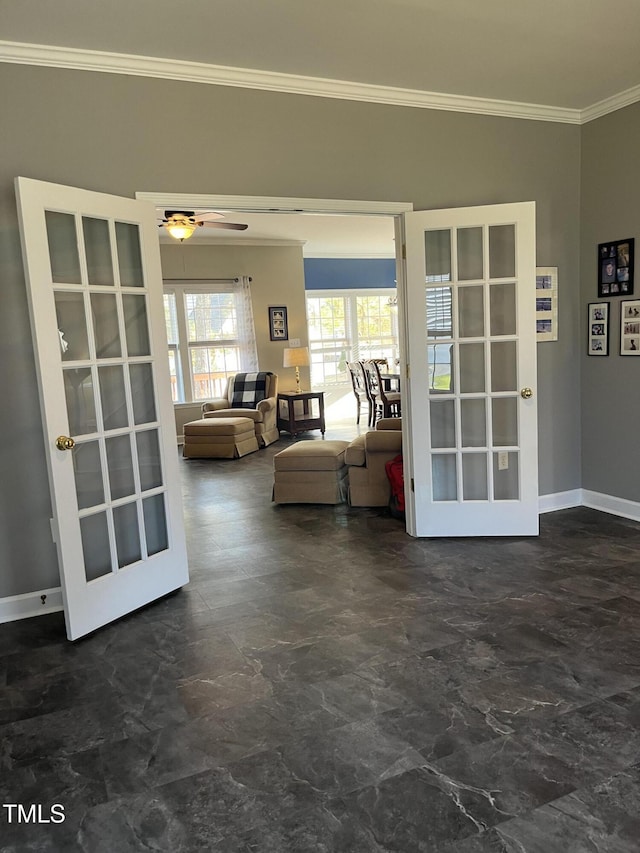 interior space with french doors, ceiling fan, and ornamental molding