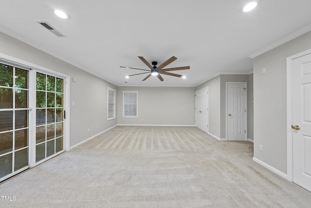 7340 Doverton Ct, Raleigh, NC 27615 - unfurnished room with ceiling fan, baseboards, light carpet, crown molding, and recessed lighting