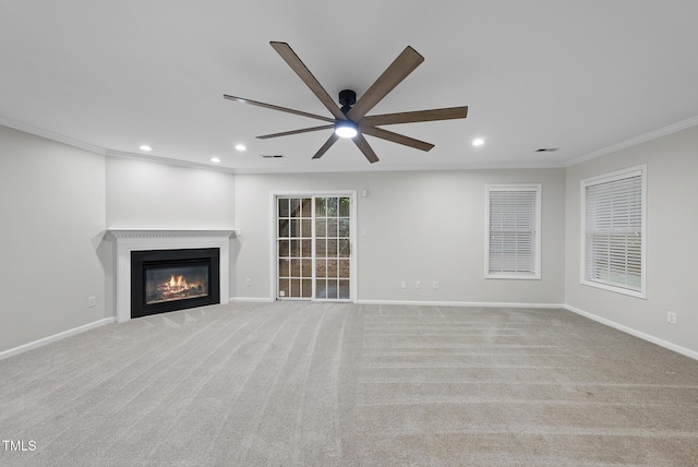 7340 Doverton Ct, Raleigh, NC 27615 - unfurnished living room with a ceiling fan, ornamental molding, recessed lighting, baseboards, and a glass covered fireplace