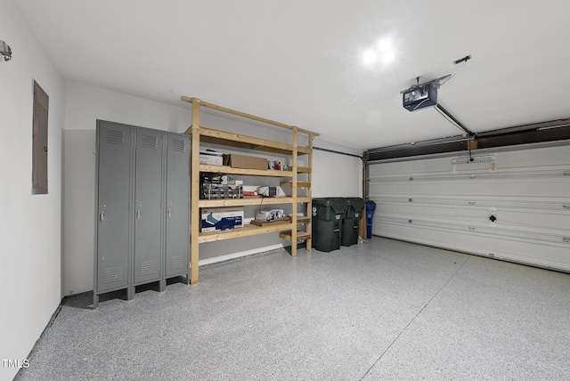 7340 Doverton Ct, Raleigh, NC 27615 - garage with electric panel and a garage door opener