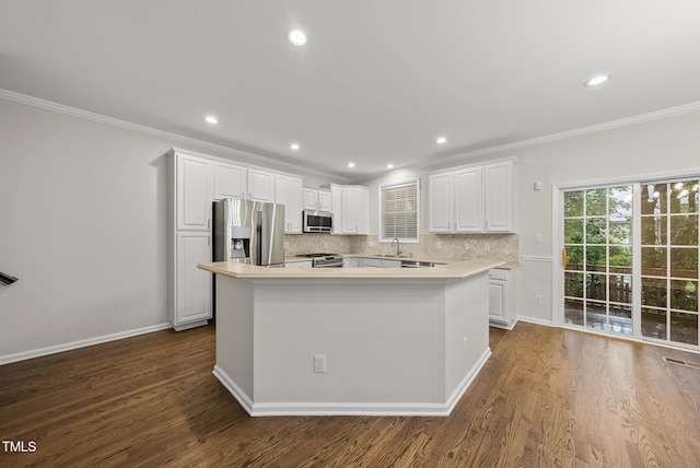 7340 Doverton Ct, Raleigh, NC 27615 - kitchen featuring stainless steel appliances, a center island, crown molding, a sink, and decorative backsplash
