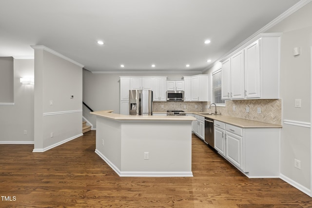 7340 Doverton Ct, Raleigh, NC 27615 - kitchen featuring stainless steel appliances, a sink, decorative backsplash, white cabinets, and recessed lighting