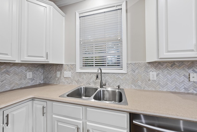 7340 Doverton Ct, Raleigh, NC 27615 - kitchen with dishwasher, a sink, decorative backsplash, white cabinets, and light countertops