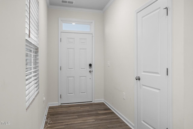 doorway with dark hardwood / wood-style flooring and ornamental molding