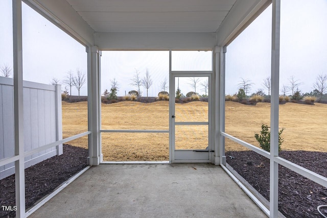 unfurnished sunroom with plenty of natural light