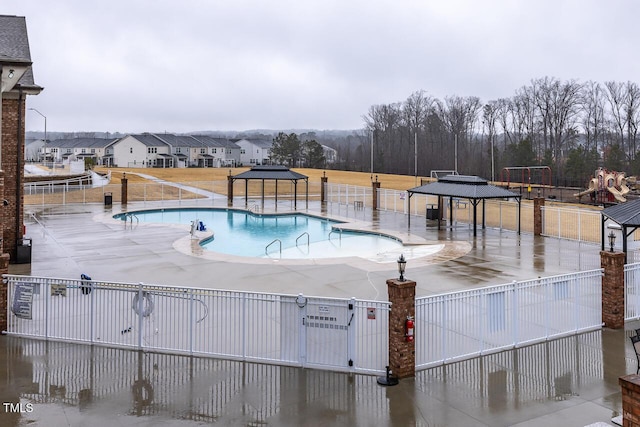 view of pool featuring a gazebo and a patio area