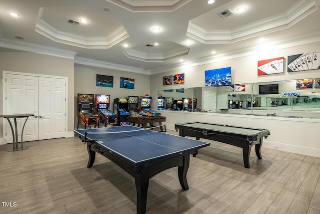 rec room featuring light hardwood / wood-style floors, ornamental molding, and billiards