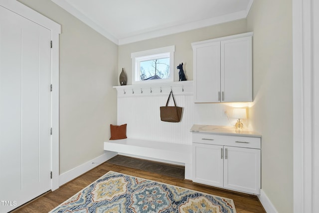 mudroom featuring dark hardwood / wood-style flooring and crown molding