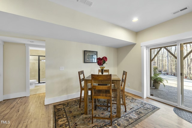 dining room featuring light hardwood / wood-style flooring