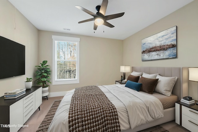 carpeted bedroom with ceiling fan