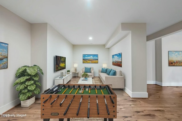 playroom with hardwood / wood-style floors