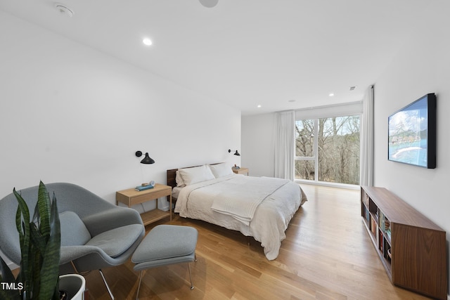 bedroom featuring light hardwood / wood-style floors