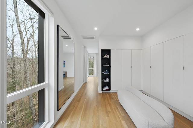 corridor featuring light hardwood / wood-style flooring