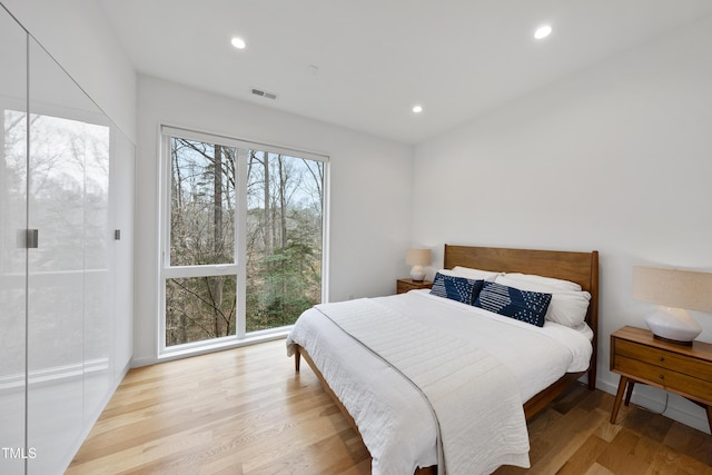 bedroom featuring light wood-type flooring