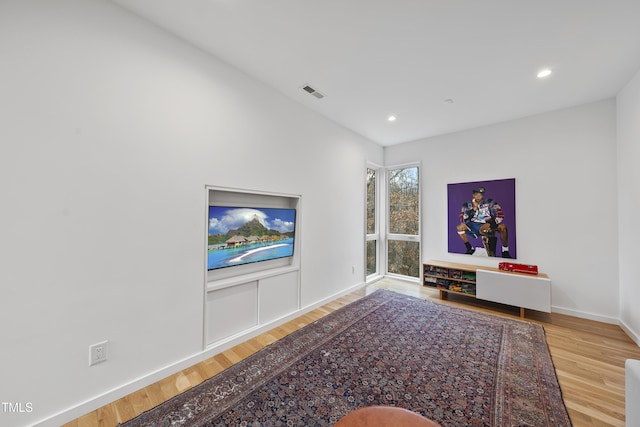 living room with hardwood / wood-style flooring