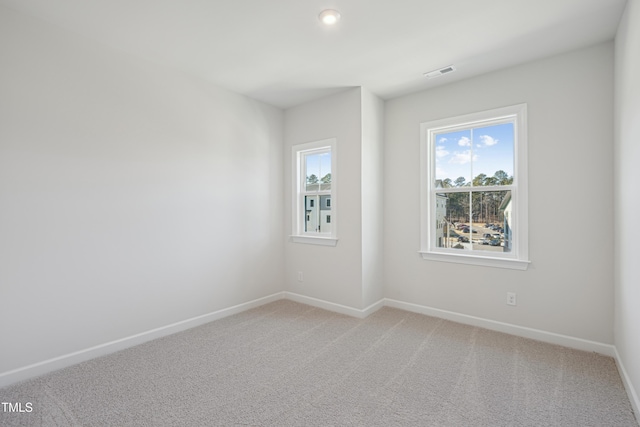 empty room with carpet floors