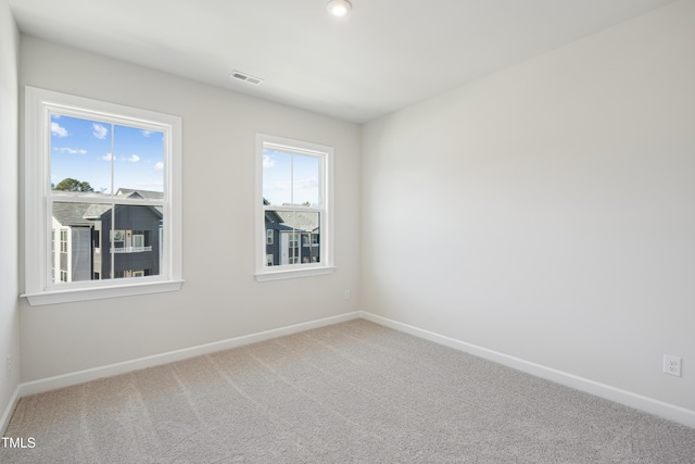 view of carpeted spare room