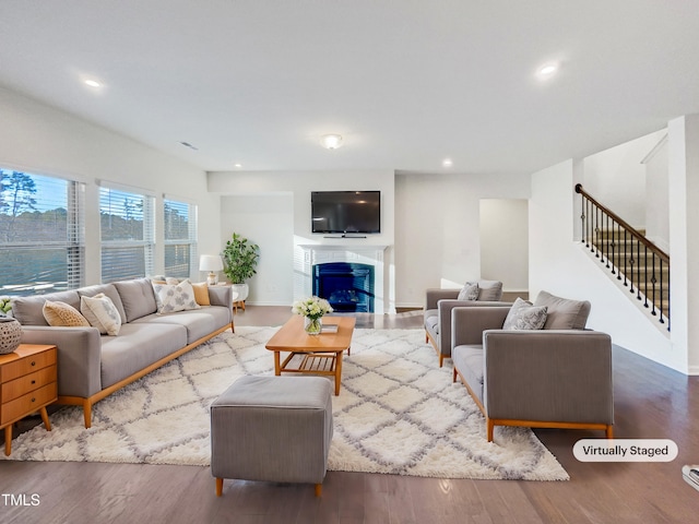 living room with hardwood / wood-style flooring