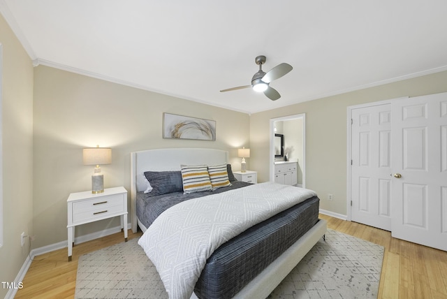 bedroom featuring connected bathroom, ceiling fan, crown molding, and light wood-type flooring