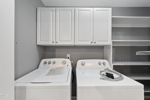 laundry room featuring washing machine and dryer