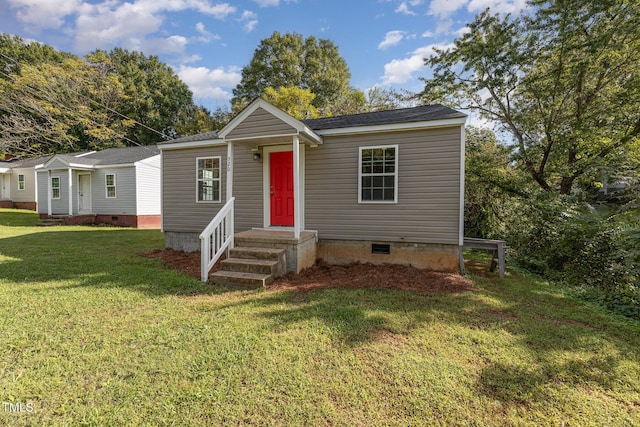 view of front facade with a front yard