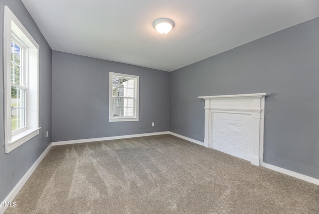 empty room with carpet flooring