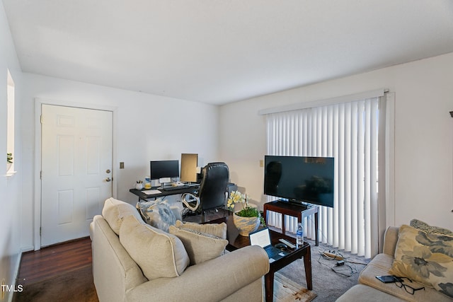 living room with dark hardwood / wood-style floors