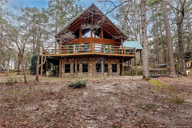 rear view of property with a deck