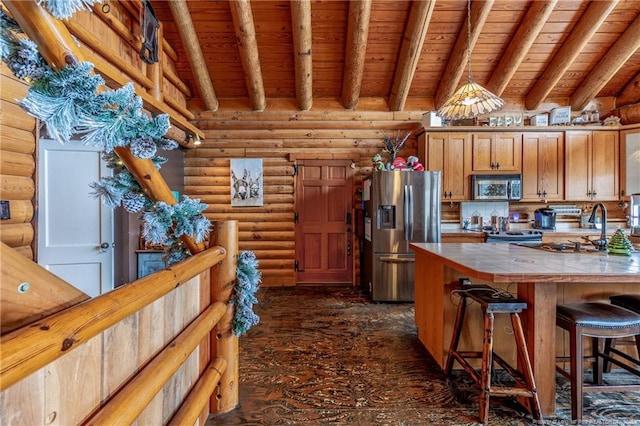 kitchen featuring tile countertops, wooden ceiling, appliances with stainless steel finishes, log walls, and beamed ceiling