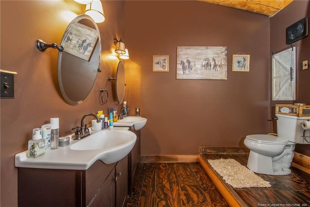 329 Silver Grove Church Rd, Rockingham, NC 28379 - bathroom with toilet, baseboards, and vanity
