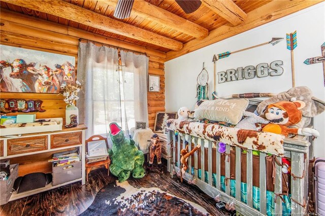 329 Silver Grove Church Rd, Rockingham, NC 28379 - bedroom featuring wood finished floors, wood ceiling with exposed beams, and log walls