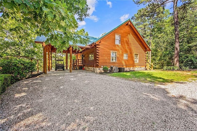 329 Silver Grove Church Rd, Rockingham, NC 28379 - view of home's exterior featuring log exterior