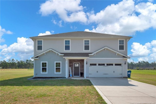 view of front of home featuring a garage and a front lawn