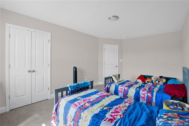 carpeted bedroom with a closet