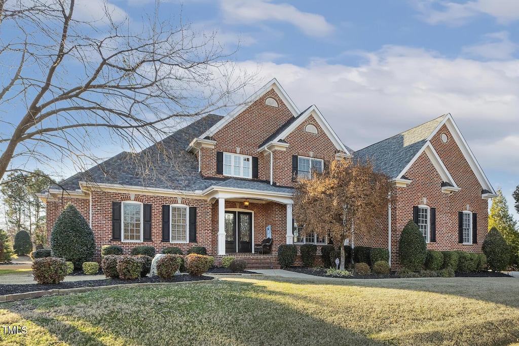 view of front of home with a front yard