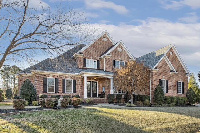 view of front of home with a front yard