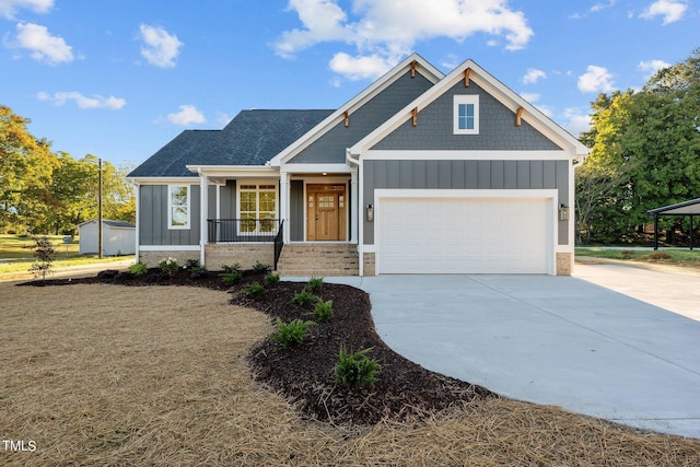 view of front of house with a porch and a garage