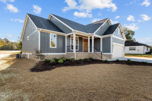 view of front of house featuring a porch and cooling unit