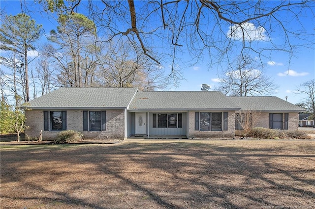 ranch-style house with a front yard