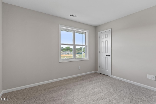 view of carpeted spare room