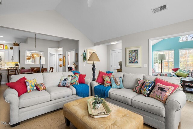 living room with lofted ceiling