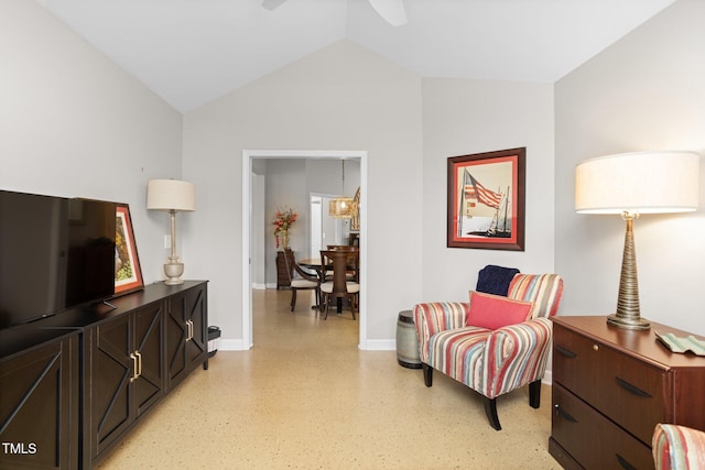 sitting room with lofted ceiling