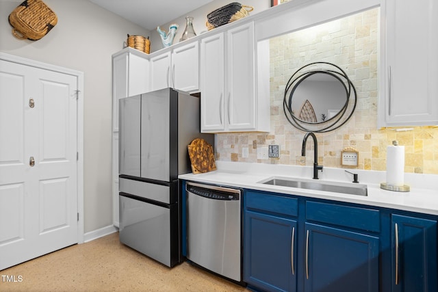 kitchen with dishwasher, blue cabinets, and sink