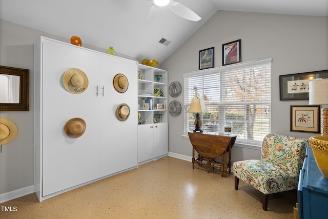 sitting room featuring ceiling fan and lofted ceiling