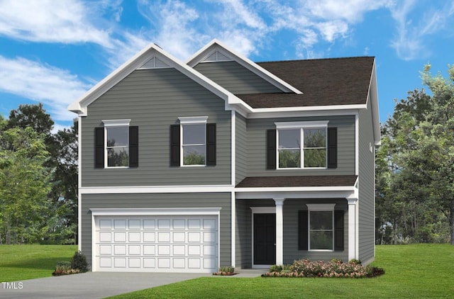 view of front of property with a garage and a front yard