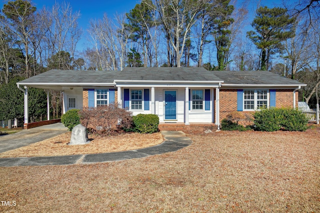 single story home with a carport