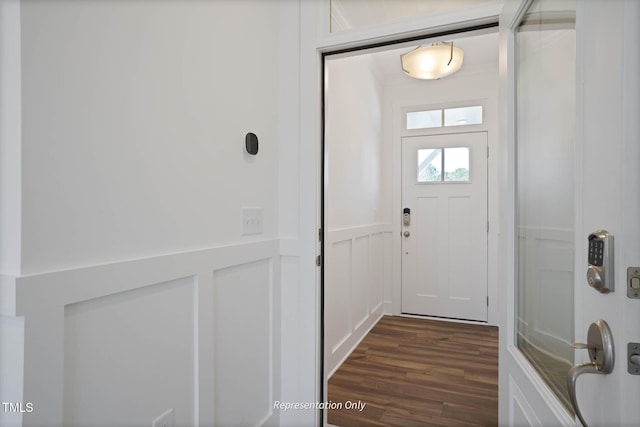 entryway with dark hardwood / wood-style floors