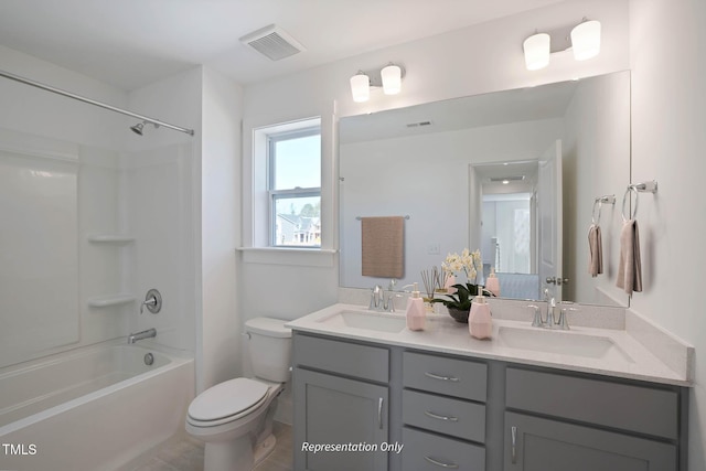 full bathroom with vanity, shower / bathing tub combination, and toilet