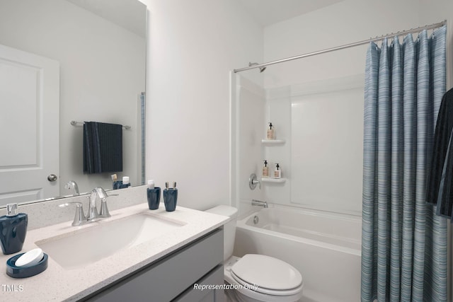 full bathroom with vanity, toilet, and shower / tub combo with curtain